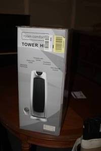 lot 123 image: Room Comforts Tower Heater with Remote Control (new in box)