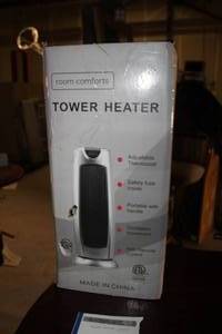 lot 103 image: Room Comforts Tower Heater with Remote Control (new in box)