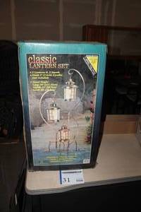 lot 31 image: Perfect Patio Classic Lantern 3-Lantern3-Stand Set (new in box)