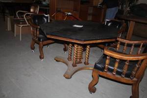 lot 55 image: Wood Octagon Game Table, Rolling Padded Wood Chairs (x3)