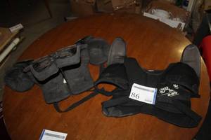 lot 86 image: Lot of (2) Football Pad Sets - Adams 13-14 Shoulder Pads ASP#100120, Supra.com M-SP5 L Shoulder Pads