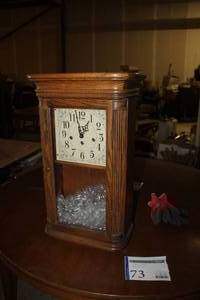 lot 73 image: Howard Miller Clock Co. Wood Wall Clock 613.108
