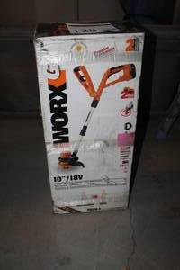 lot 138 image: Workx 18V Cordless Lawn Trimmer 10 (new in box)