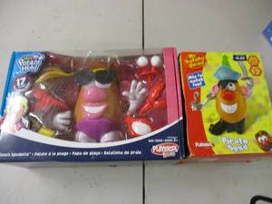 lot 9 image: Mr. and Mrs. Potato Head...