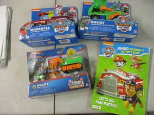 lot 29 image: Paw Patrol Toys and Activity Book...