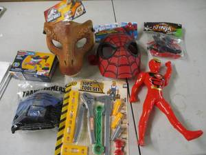 lot 58 image: Dinosaur and Spiderman masks, and o...