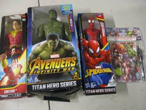 lot 67 image: MarvelDC action figures and note p...