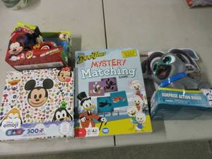 lot 84 image: Disney toys, puzzle, and matching g...