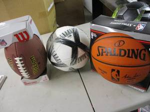 lot 88 image: Football, basketball, and soccer ba...