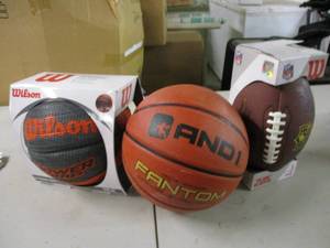 lot 91 image: 2 Basketballs and a football...