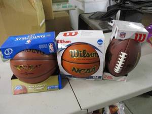 lot 94 image: 2 Basketballs and a football...