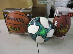 lot 97 image: soccer ball, football, and basketba...
