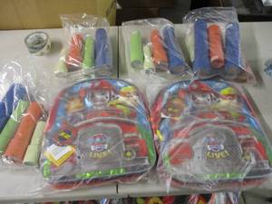 lot 101 image: 2 Paw Patrol backpacks and a bunch ...