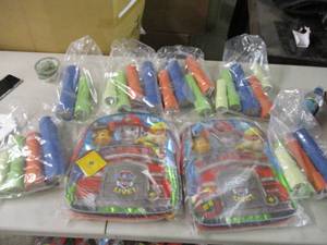 lot 102 image: 2 Paw Patrol backpacks and a bunch ...