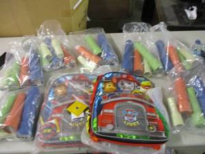 lot 103 image: 2 Paw Patrol backpacks and a bunch ...