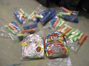 lot 104 image: 2 Paw Patrol backpacks and a bunch ...