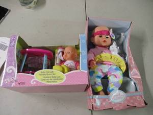 lot 105 image: 2 baby doll sets...