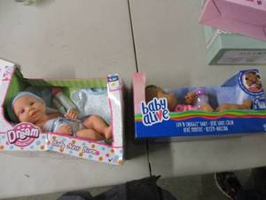 lot 107 image: 2 baby doll sets...