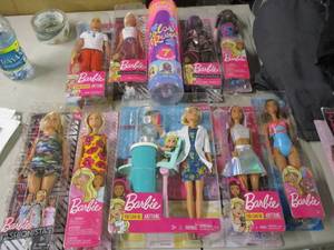 lot 125 image: 8 Barbies and 2 Barbie Sets...