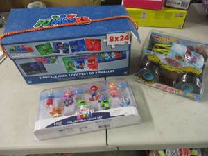 lot 143 image: PJ Masks Puzzles, Muppets Character...