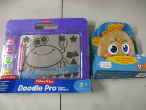 lot 144 image: Fisher Price Doodle Pro, and Musica...