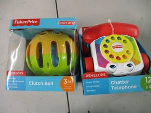 lot 150 image: Fisher Price Cloth Ball and chatter...