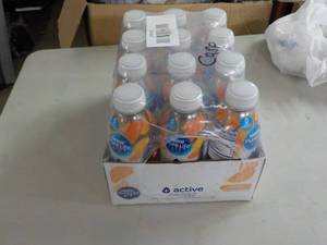 lot 277 image: Orange Nestle Pure Life Water 12 Bo...