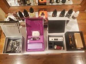 lot 192 image: Vaping machines and assorted flavors
