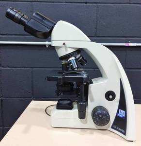 MSRP $1800&nbspMedical Laboratory POWERED LIGHT UP BINOCULAR Microscope WITH 4 OBJECTIVES &amp STORAGE COVER - GREAT WORKING CONDITION