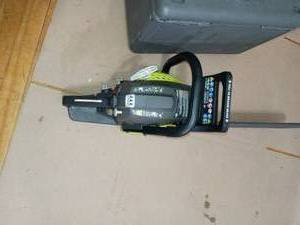 18 in. 38cc 2-Cycle Gas Chainsaw with Heavy Duty Case by RYOBI- not used missing oil, fuel line kit and chainsaw tune up kit