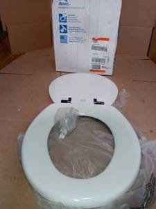 Weston Never Loosens Round Closed Front Toilet Seat in White with Oil Rubbed Bronze Metal Hinge by BEMIS - open box not used