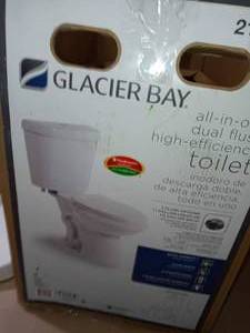 2-piece 1.1 GPF1.6 GPF High Efficiency Dual Flush Complete Elongated Toilet in White, Seat Included by Glacier Bay- open box not used