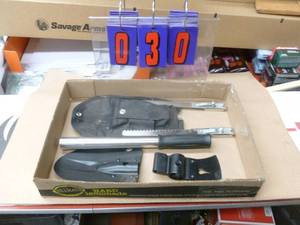 Combo knife,shovel & ax. As shown.