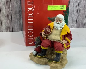 lot 2200 image: Clothtique Firefighter Santa, 8 tall