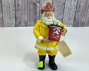 lot 2190 image: KSA Fabriche Firefighter Santa, 11 tall