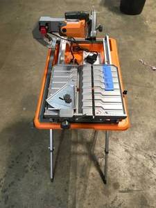 Ridgid  Hover Image to Zoom Best Seller 9 Amp Corded 7 in. Wet Tile Saw with Stand not used see pictures