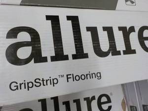 9 cases Allure Grip strip Flooring...