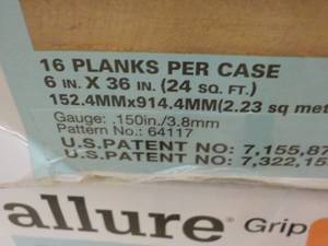 8 cases Allure Grip strip Flooring...