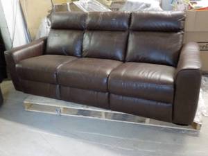 Couch 90 Long has  small rips as s...