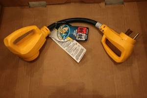 lot 22 image: Camco Powergrip Adapter - New