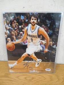 lot 49 image: PSADNA Ricky Rubio Autographed Minnesota Timberwolves Photo 8 X 10