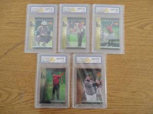 lot 98 image: (5) WCG Gem Mint 10 2001 Upper Deck Tiger Woods Rookies - Tigers Tale