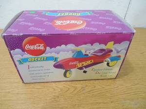 lot 176 image: Coca-Cola Rocket Die Cast Metal 13 Scale Pedal Air Plane LK