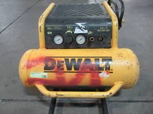 lot 7 image: DEWALT 4.5 Gal. Portable Electric Air Compressor D55146