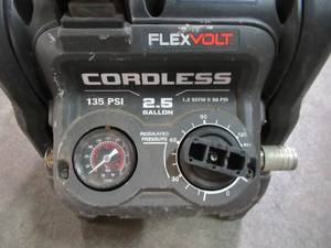 lot 12 image: DEWALT FLEXVOLT 60V MAX 2.5 Gallon Cordless Air Compressor DCC2560T1