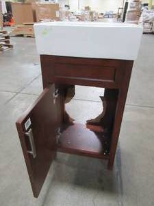 lot 407 image: Home Decorators Collection Arvesen 18 in. W x 12 in. D Vanity in Tobacco with Vitreous China Vanity Top in White and Basin - Broken Back Wall.