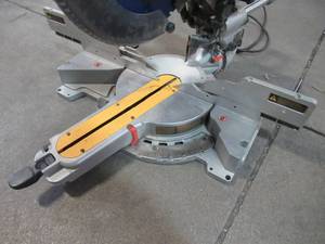 lot 45 image: DEWALT 12-Inch Double-Bevel Slide Compound Miter Saw DW718