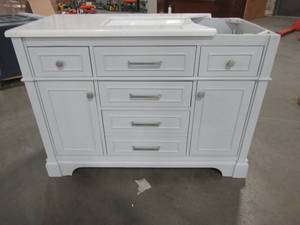 lot 56 image: Home Decorators Collection Melpark 48 in. W x 22 in. D Bath Vanity Cabinet in Dove Grey - Cracked Top (attached) and some slight scratches on RH Side.