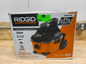 RIDGID 4 Gal. 5.0-Peak HP Portable WetDry Shop Vacuum with Filter, Hose and Accessories