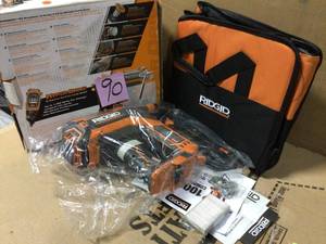 lot 90 image: 18-Volt Cordless Brushless HYPERDRIVE 16-Gauge 2-12 in. Straight Finish Nailer(Tool Only), Belt Clip, Bag, Sample Nails by RIDGID in good condition